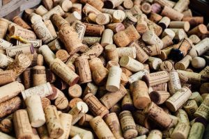 a pile of brown cork lids