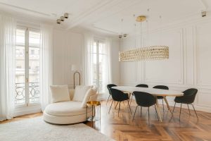 a sitting room arrangement with parquet flooring