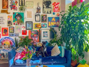 a maximalist interior full of posters